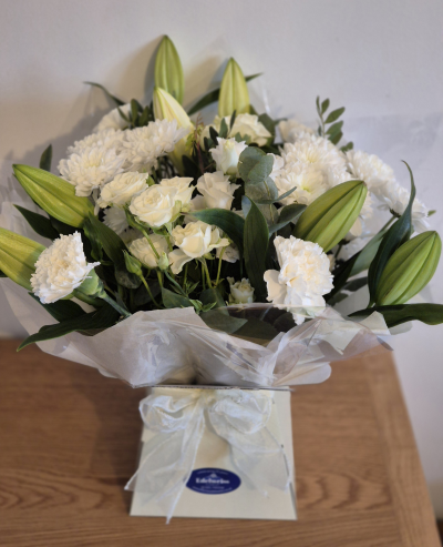 In my thoughts - A beautiful selection of fresh flowers in shades of white. A classic arrangement.