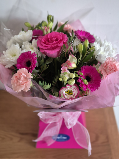 In the pinks - A beautiful fresh selection of flowers in shades of pink. Seasonal and chosen each day by the florist.