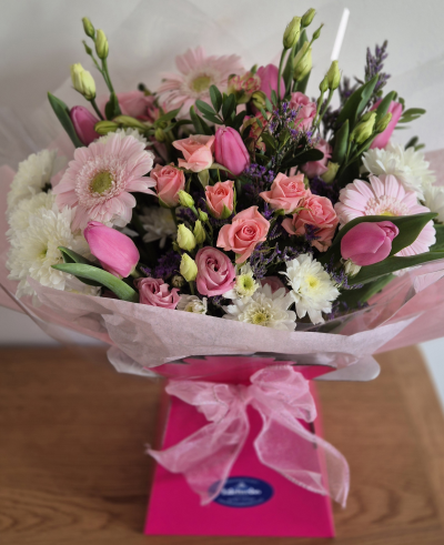 Just For You - A beautiful selection of fresh flowers especially chosen each day by the florist in shades of pink.
