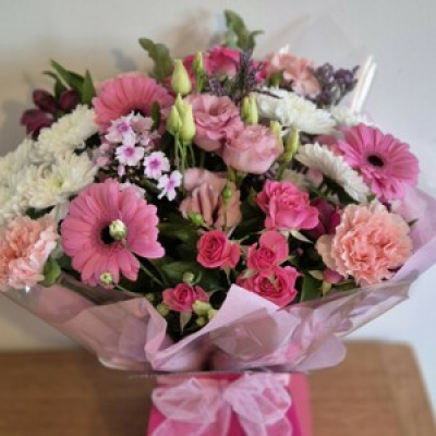 Pink Surprise  - A beautiful fresh selection of season flowers in shades of pink. Delivered in water ready to enjoy. 