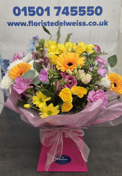 Summer brights - A bright and sunny selection of fresh summer flowers. Arranged in water ready to enjoy.