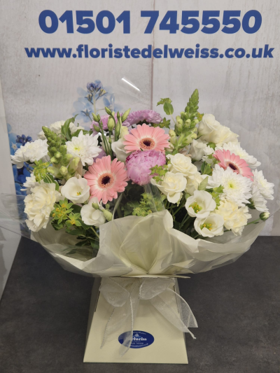 Pastel Love - A beautifully handcrafted bouquet featuring fresh seasonal flowers in soft ivory, blush pink and lilac tones, thoughtfully arranged for an elegant gift. Flowers are subject to seasonal availability.